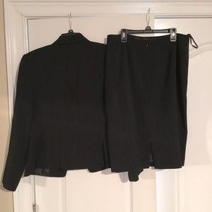 Two piece black skirt suit pin stripes